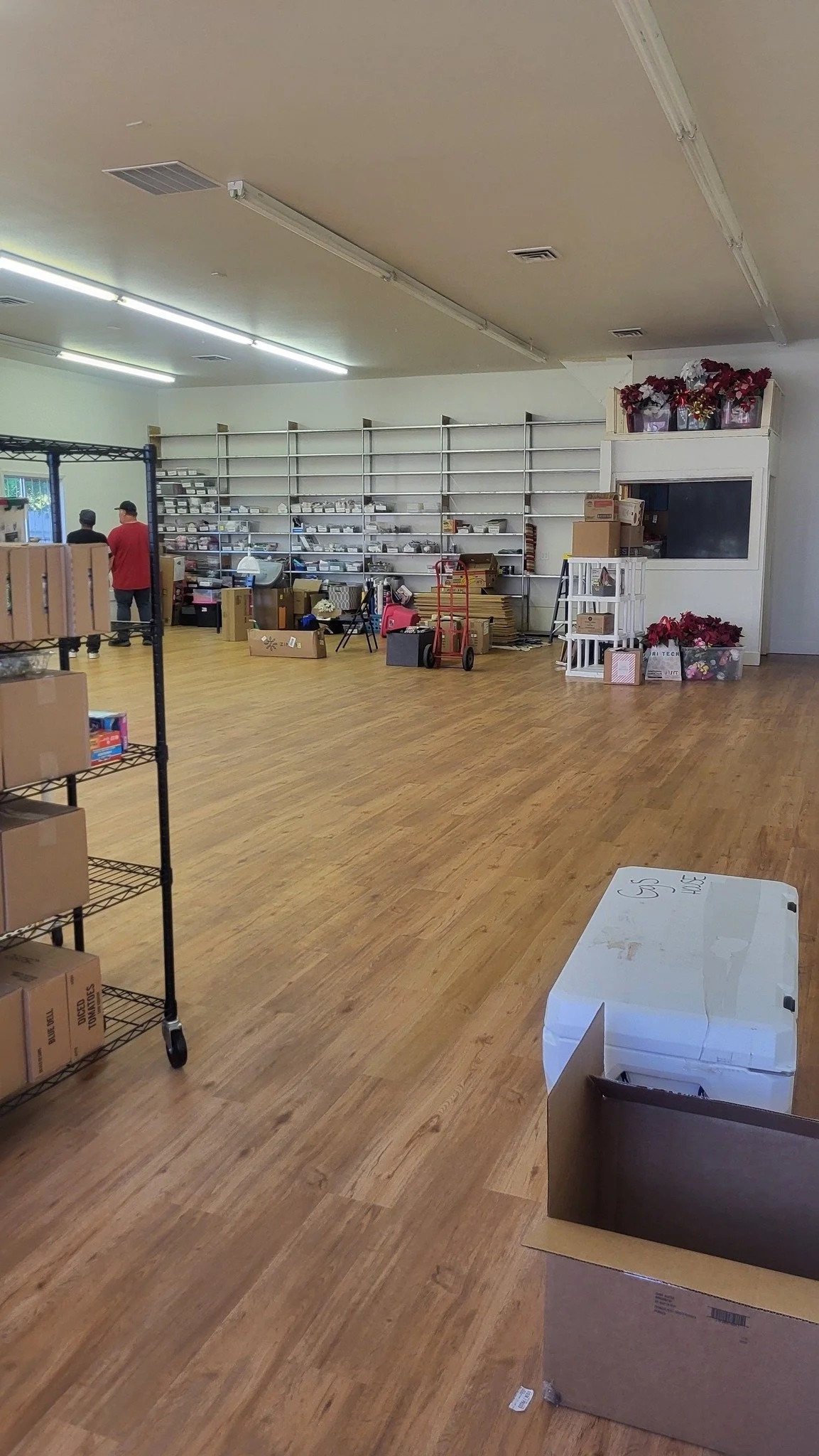 Shelving stocked with goods inside the new Gg's House space