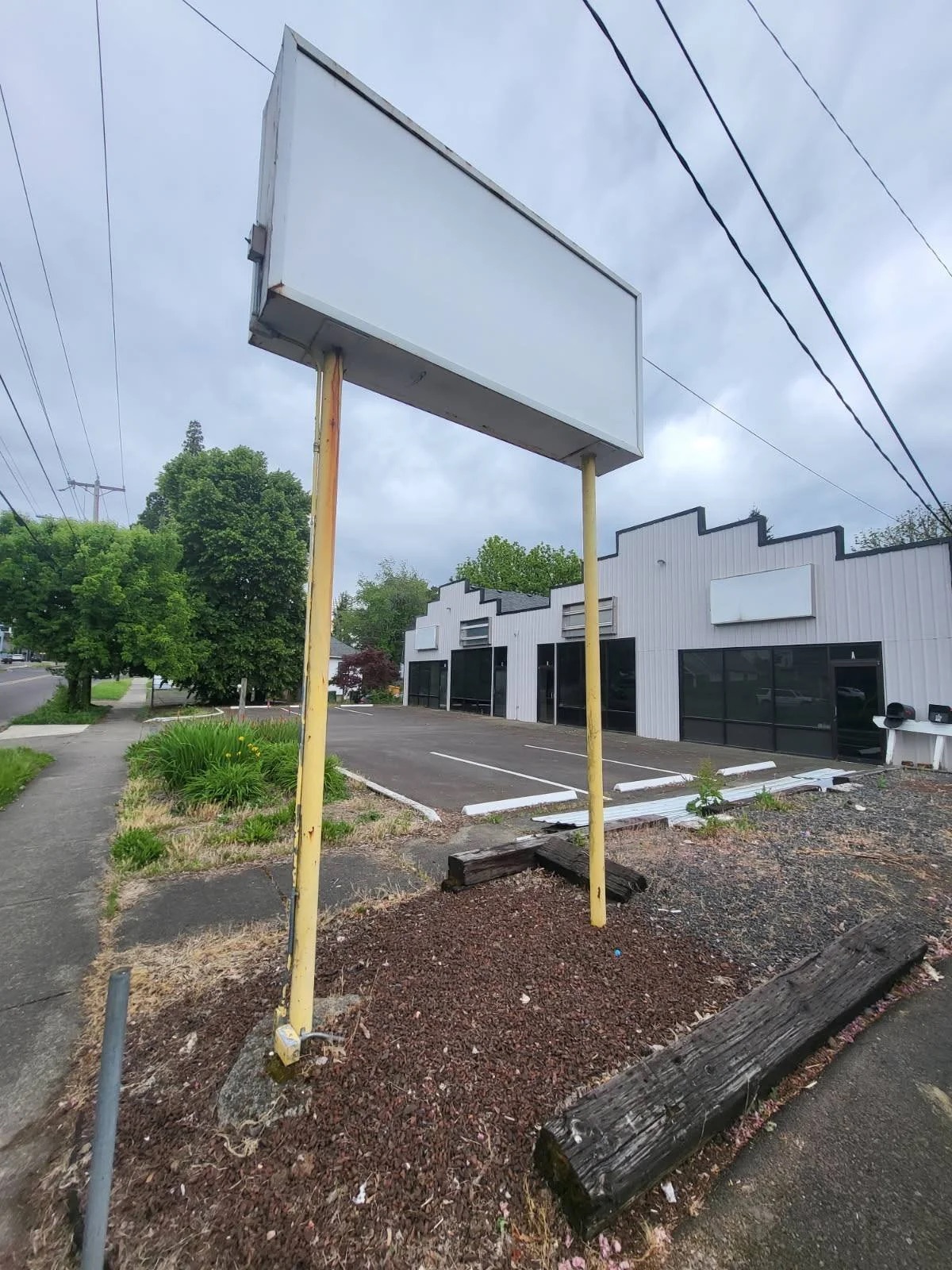 New sign posts going up outside the building
